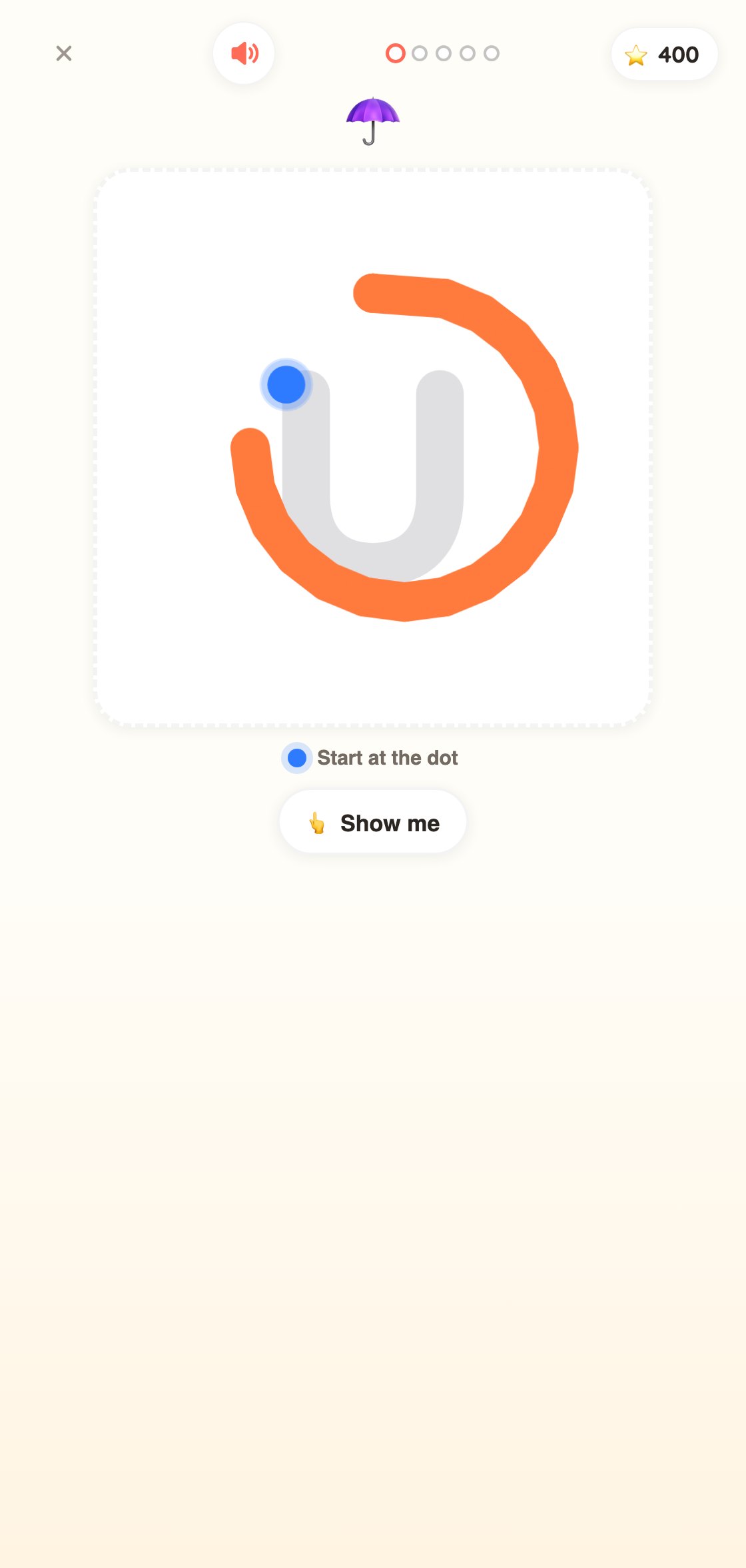 A Writing round: tracing the letter o over a faint guide with a finger